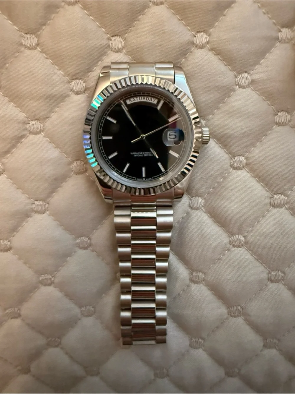 Silver Stainless Steel Watch with Black Dial, Date Window, and Day Display